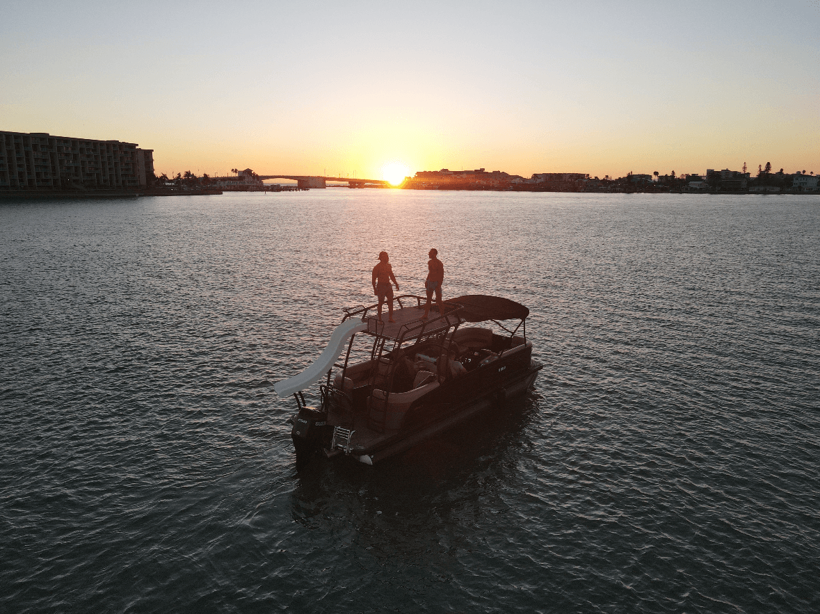 Pontoon boat at sunset on Tampa Bay